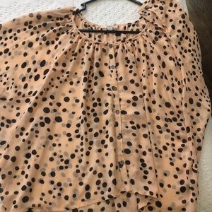 Polka dot flowing button up blouse.